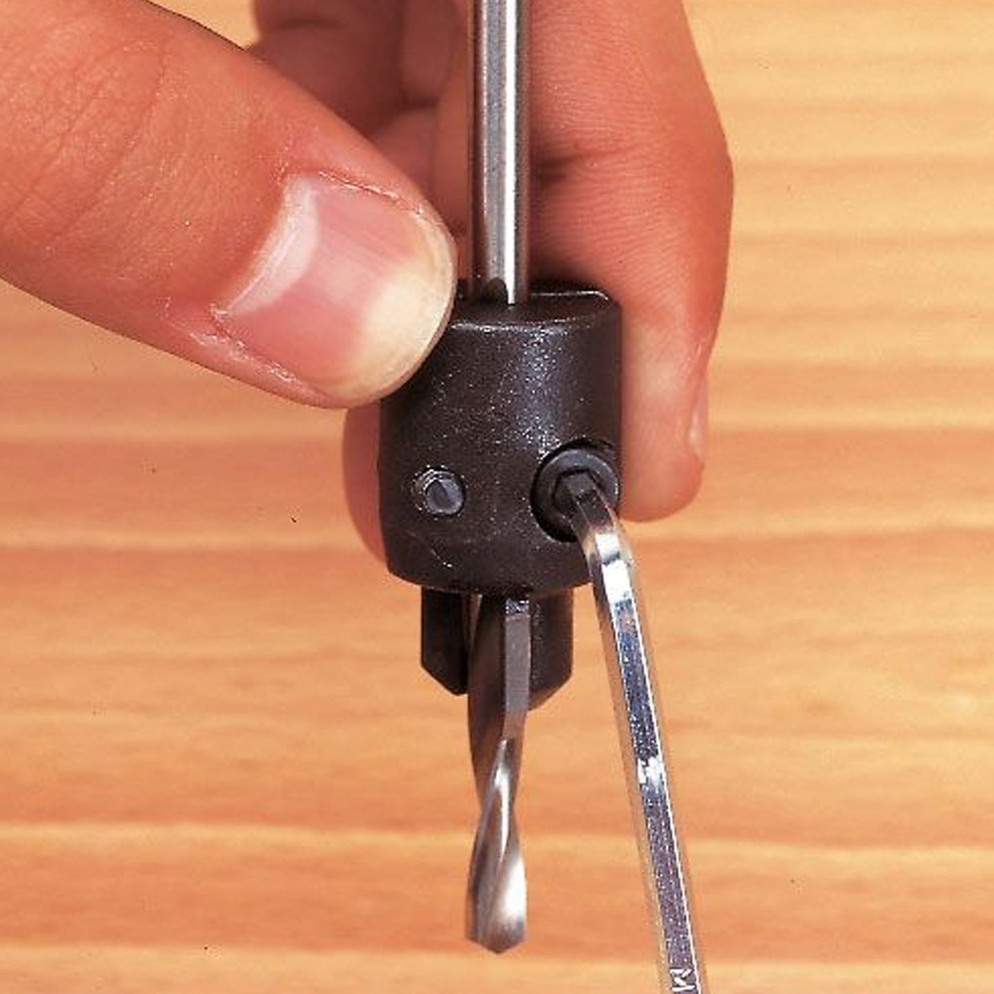 Trend Universal Countersink Drill Bit Clamp UNI/CS Being Fitted to a Drill Bit