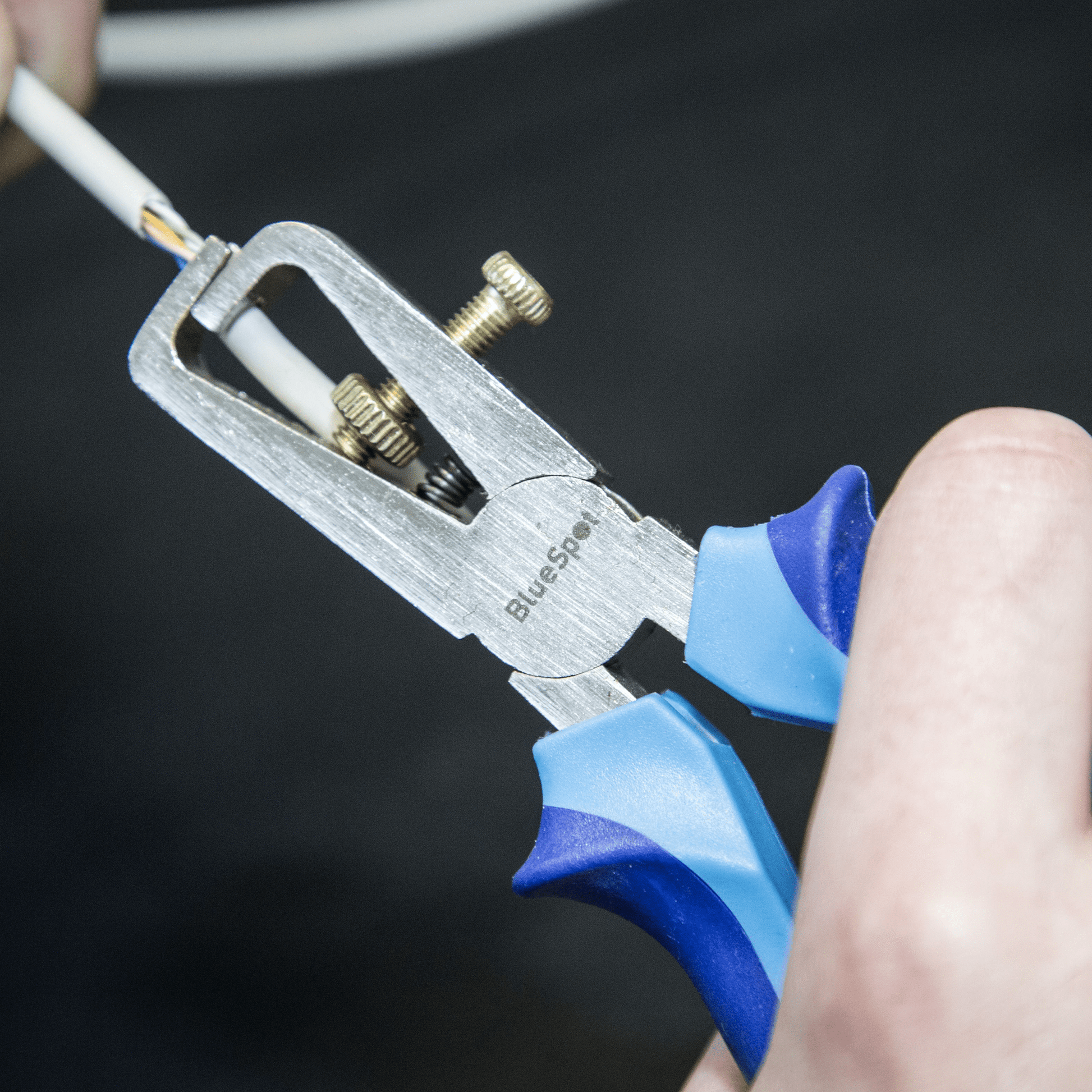 Blue Spot Wire Stripping Pliers - 150mm Being Used to Strip Wire