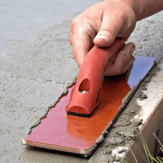 Marshalltown Cement Resin Hand Float Square End 14in x 3 1/2in Being Used on Concrete