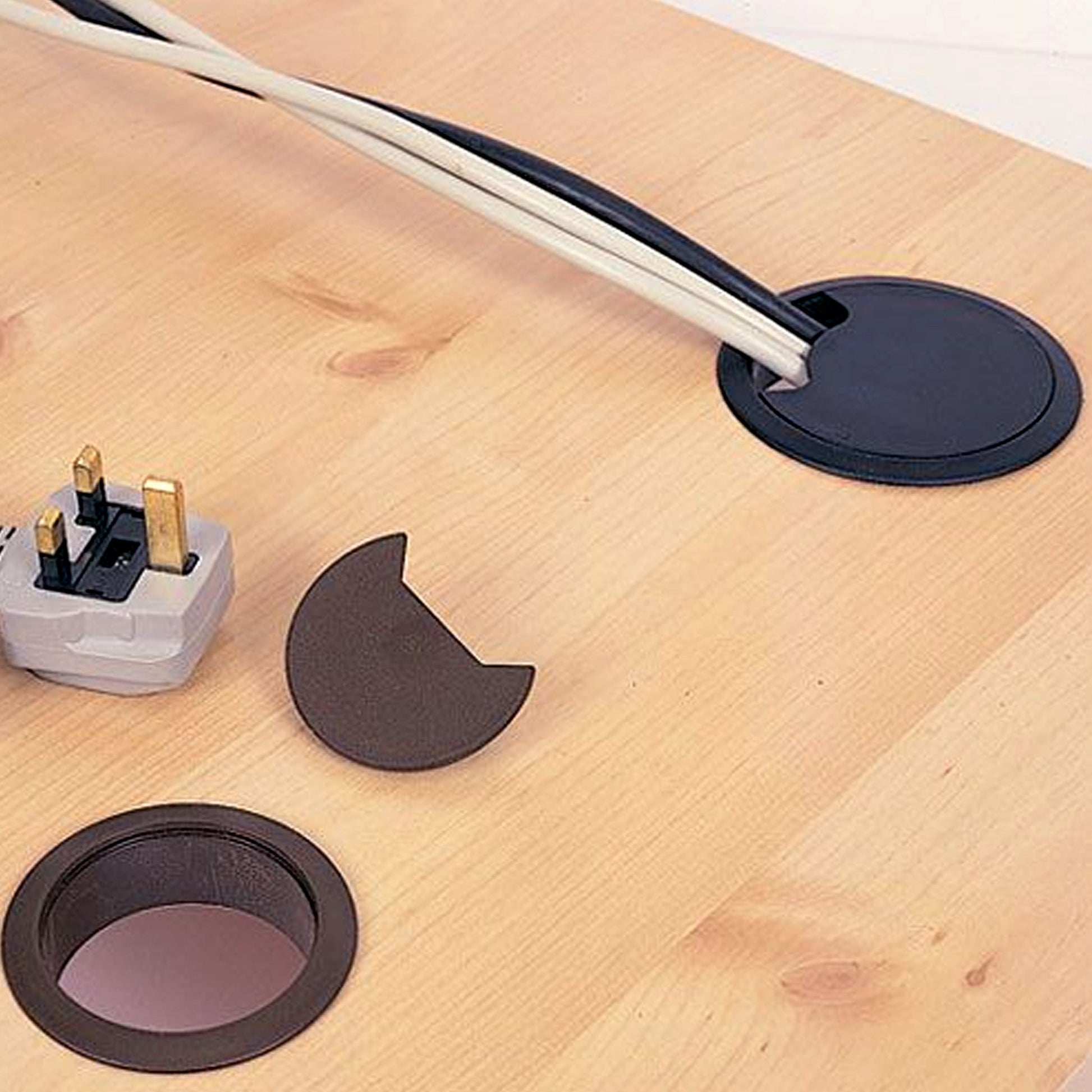Trend Desk Cable Tidy Insert and Spring Loaded Coverplate CTI/60/PK3 Inserted in to a Desk